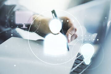 Poster - Double exposure of social network icons concept with hand writing in notepad on background with laptop. Networking concept