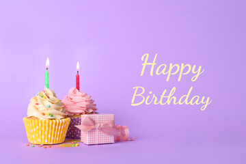 Wall Mural - Birthday card with cupcakes and gift box on violet background