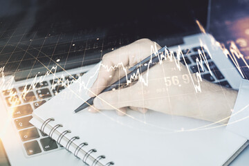 Poster - Double exposure of abstract creative financial diagram with hand writing in notebook on background, banking and accounting concept