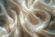© Riya - The texture and folds of a fabric, possibly linen or a similar material.