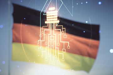 Poster - Virtual creative light bulb illustration with microcircuit on German flag and sunset sky background, future technology concept. Multiexposure