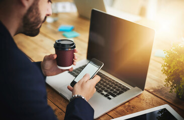 Aufkleber - Coffee, phone and laptop with man at coworking desk with blank screen for social media break on tech. Morning, web designer and creative job with latte and mobile scroll at office with design work
