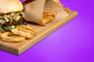 Wall Mural - Tasty fresh hot burger on a wooden board