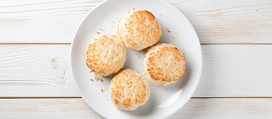 Aufkleber - Cottage cheese biscuits displayed on a white plate atop a wooden table, ideal for a delicious homemade snack. with copy space image. Place for adding text or design