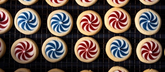 Poster - Tray of sugar cookies decorated with red, white, and blue swirls, ready for cooling on a rack after baking. with copy space image. Place for adding text or design