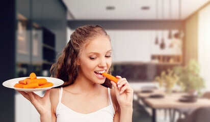 Canvas Print - Young happy woman eating tasty food