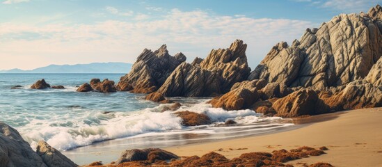 Aufkleber - Scenic seascapes with waves forcefully crashing against rugged rocks on the beach. with copy space image. Place for adding text or design