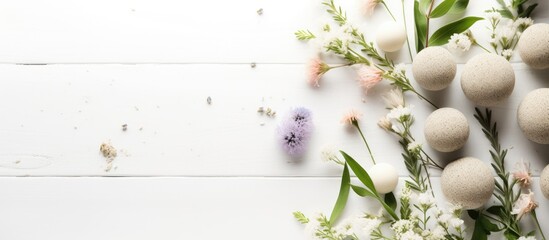 Fototapete - Floral arrangement and eggs displayed on a clean white wooden surface with a backdrop of white. with copy space image. Place for adding text or design