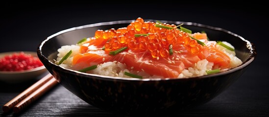 Wall Mural - A bowl of delicious seafood rice featuring fresh salmon, savory salmon roe, and succulent crab meat. with copy space image. Place for adding text or design