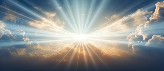 Wall Mural - Sunlight beams shining through a thick cloudy sky background, creating a mesmerizing close-up view of a sunbeam with clouds. with copy space image. Place for adding text or design
