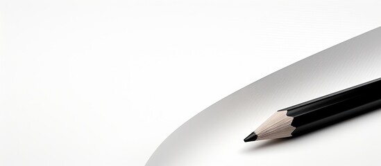 Poster - Laying black pencil on stark white background, Close-up of pencil drawing black line on white paper. with copy space image. Place for adding text or design