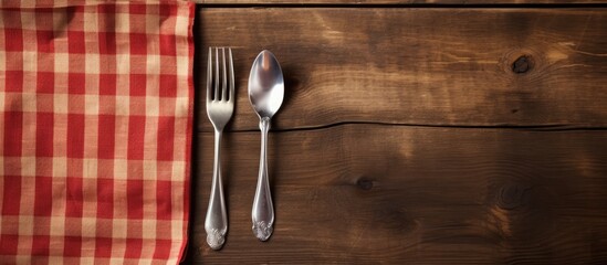Fototapete - Close-up of utensils including a fork and knife placed on a table surface. with copy space image. Place for adding text or design