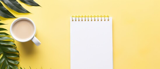 Yellow notepad on a work table during a parent meeting with text on the page. with copy space image. Place for adding text or design