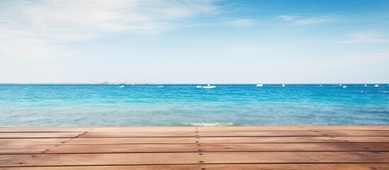 Aufkleber - Wooden deck overlooking the ocean, with a view of boats in the distance. with copy space image. Place for adding text or design