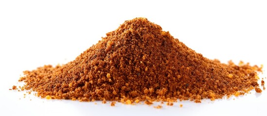 Poster - A close-up view of a mound of brown cocoa powder on a plain white background. with copy space image. Place for adding text or design