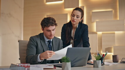 Wall Mural - Stressed business partners working at cabinet closeup. Frustrated boss typing