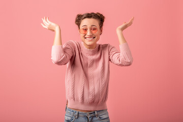 Wall Mural - young pretty cute woman in stylish outfit in pink sweater and sunglasses