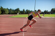 © Iryna Auhustsinovich/Stocksy - athletic girl training at the stadium