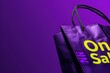 © AiHRG Design - A purple shopping bag with the word On Sale printed on it, set against a vibrant purple background.