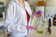 © Leonardo Borges Nuñez/Stocksy - Crop scientist in laboratory during chemical experiment