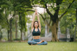 © Kritdanai - Young asian woman is practicing yoga exercises in the morning, yoga relax outdoor concept