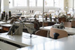 © Hernandez & Sorokina/Stocksy - Close Up Of Spacious Bright Sewing Factory Room