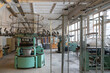 © Hernandez & Sorokina/Stocksy - Circular Knitting Machines In Spacious Room