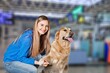 © BillionPhotos.com - transportation of pets. Woman with dog for air travel.
