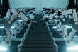 © Giada Canu/Stocksy - 3D Render of Robotic Arms on Futuristic Assembly Line