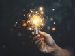 © Business Pics - Inspirational thoughts Human hand holds a light bulb for lighting. Ideas for creativity and inspiration for sustainable business development and success generative by ai