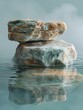© Aliaksandr Siamko - Two large rocks are floating on the surface of a body of water