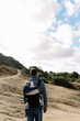 © Serena Burroughs/Stocksy - young father hiking in san diego california with son in baby carrier