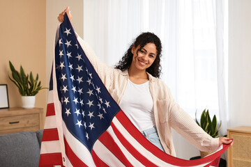 Poster - Beautiful young happy African-American woman with USA flag at home