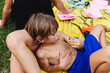 © Michela Ravasio/Stocksy - Little boy holding a piece of cake