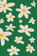 © Tatyana Lavrova/Stocksy - Different white flowers with yellow center pattern on green backdrop