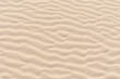 © John White/Stocksy - Rippled sand on a sand dune.