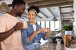 © Wavebreak Media - A young diverse couple preparing breakfast in modern kitchen