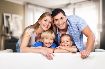 Canvas Print - Happy attractive family at cozy home