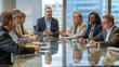 © InfiniteFlow - Diverse group of professionals having a meeting around a conference table. AIG535