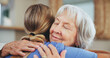 © AchillesReel/peopleimages.com - Senior woman, nurse and hug with support for love, elderly care or assistance at nursing home. Female person or caregiver with mature patient for embrace, healthcare or bonding at old age house