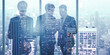 © Who is Danny - Business people silhouettes on blurry toned blue city background. Success, teamwork and workspace concept. Double exposure.