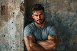 © standret - Portrait of a muscular man in casual clothes leaning on wall