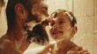© Iona - Happy father and son covered in soap bubbles enjoying bath time