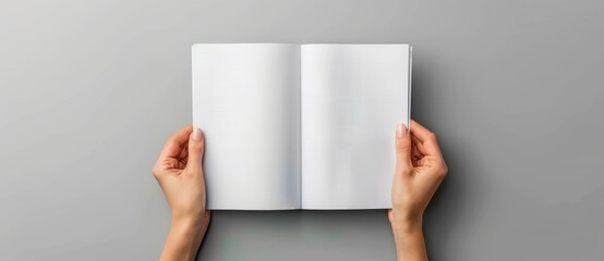 Poster - Mockup of an A5 open book with a blank page for design isolated on a white background providing copy space