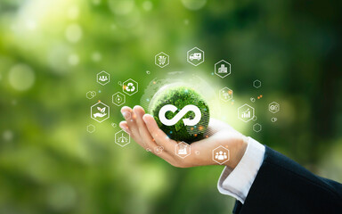 the circular economy icon in globe on nature background in The concept circular economy for future growth of business and design to reuse and renewable material resources and environment sustainable