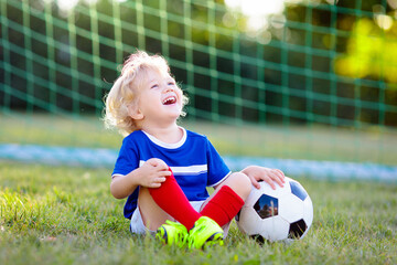 France football fan kids. Children play soccer.