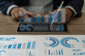 Poster - analyzing business person reports business meeting for analysis laptop and graph documents discussin