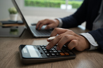 Poster - calculate accounting business man using calculator business man using calculator close-up