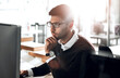 © Reese Coop/peopleimages.com - Thinking, computer and businessman in office reading research of company policy review information. Ideas, technology and professional male attorney working on corporate legal case in workplace.
