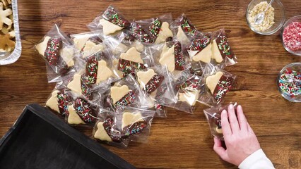 Wall Mural - Festive Cookie Packaging with Chocolate-Dipped Christmas Delights